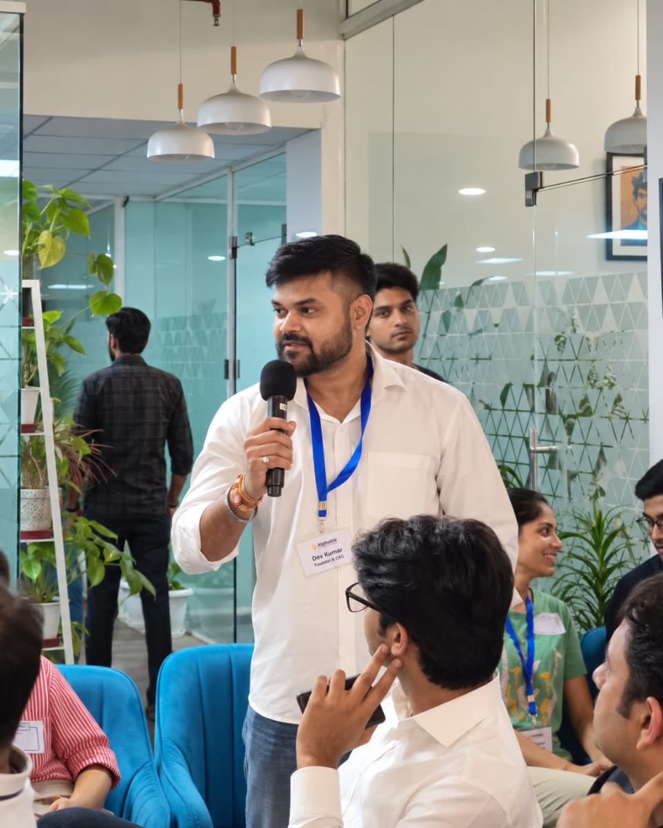 Dev Kumar speaking at an Alphabiz team session — Founder & CEO, Alphabiz